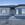 Фасадные термопанели с гладким светло-серым кирпичом, углы и эркер - темный серо-голубой кирпич